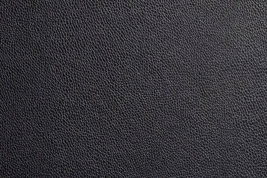 Black fine texture of genuine rough leather. Natural expensive products