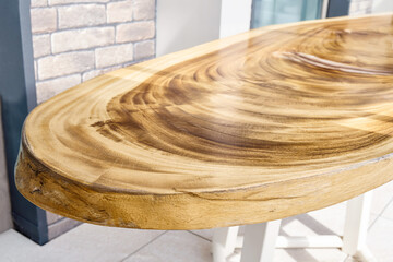 Wonderful designer dining table made of large lacquered live edge suar wood slab on metal carcass...