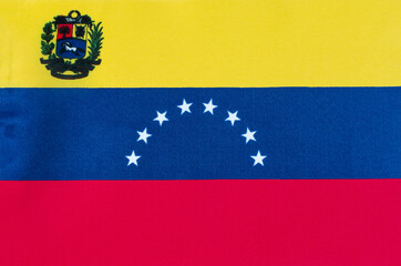 Naklejka premium fabric national flag of venezuela close-up