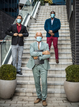  Small Group Of Business Men With Protective Mask On Face.