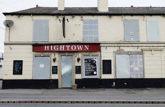 Castleford, UK - March 6th, 2015: Closed down boarded-up pub Hightown Castleford West Yorkshire UK