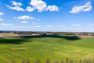 Naklejka premium Aerial view of agricultural landscape with fields in spring season.