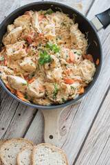 Rice pasta with vegetables and meat.