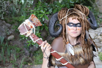 Very attractive female viking holding axe