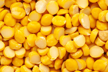 micro Close up of  Organic Bengal Gram (Cicer arietinum) or split yellow chana dal  Full-Frame Background. Top View