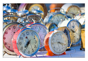 Learn to manage the time - Old colored metal table clocks, concept image in jigsaw puzzle shape