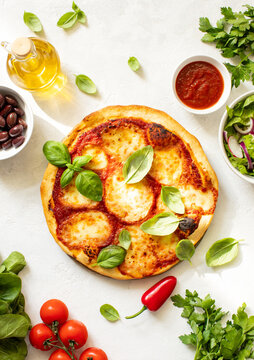 Home-baked Italian pizza Margherita top-down view