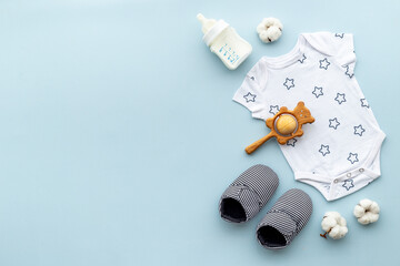 Bodysuit and shoes for baby boy. Baby shower. Top view