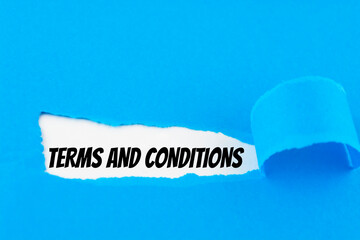 Text Terms And Conditions appearing behind ripped blue paper.