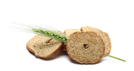 Bread crisps with bran and salt and young green ear of wheat isolated on white background