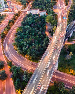 Aerial view of vehicles driving the freeway in Lisbon at sunset, Alc&acirc;ntara, Lisbon, Portugal.