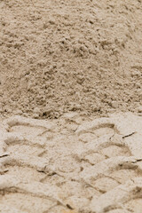 Sand Texture. Brown sand. Background from fine sand. Close-up image.