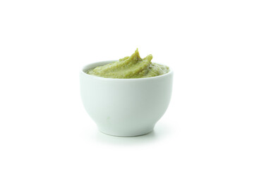 Bowl with wasabi isolated on white background