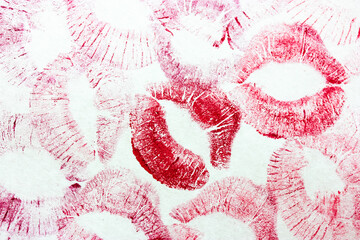 A lot of red kisses isolated on white background. Female lip prints on paper. Lipstick kisses. Print of lips. Beautiful lips stamps. Valentine's day, romantic mood and love concept. Kiss and love you.