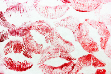 A lot of red kisses isolated on white background. Female lip prints on paper. Lipstick kisses. Print of lips. Beautiful lips stamps. Valentine's day, romantic mood and love concept. Kiss and love you.