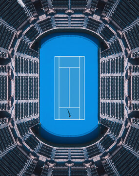 Aerial view of a person playing alone in a tennis court in Shenzhen, China.