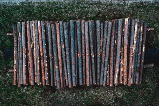 Aerial view of freshly cut trees stacked in the forest and ready to transport to the factory, shot in Uzusaliai, Kaunas, Lithuania.