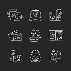 Company branding materials chalk white icons set on black background. Creating stylish clothes and accessories to look fashionable. Beautiful items. Isolated vector chalkboard illustrations