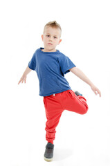 Little cool hip-hop boy in dance. Isolated on white background 