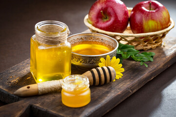 Sweet honey, with kitchen accessories in the composition on the table.