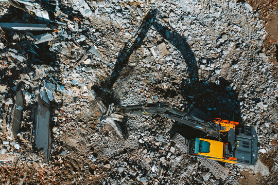 Aerial view of old building demolition work process in construction site in Kaunas city, Lithuania.