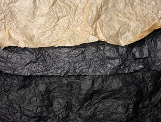 crumpled black and brown paper, abstract texture background