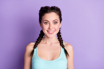 Portrait of attractive cheerful funny girl wearing tanktop isolated over violet purple color background
