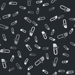 Grey Chainsaw icon isolated seamless pattern on black background. Vector