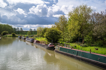 The Grand Union canal at Stoke Bruerne in Northampton just below the Blisworth tunnel. Stoke Bruerne is the location of a large number of locks. 