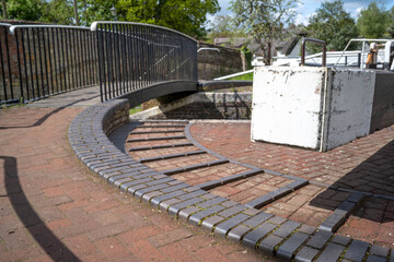 The Grand Union canal at Stoke Bruerne in Northampton just below the Blisworth tunnel. Stoke Bruerne is the location of a large number of locks. 