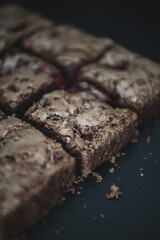 Tasty vegetarian brownie made from chocolate and cacao. Delicious chocolate pie. Selective focus....
