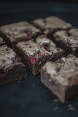 Tasty vegetarian brownie made from chocolate and cacao. Delicious chocolate pie. Selective focus....