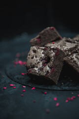 Tasty vegetarian brownie made from chocolate, cacao and raspberry. Delicious chocolate pie....