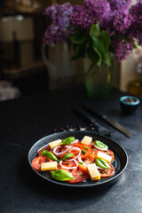 summer tomato salad veggie vegetable, cheese, onion diet vitamin on the table healthy food meal snack copy space food background rustic. top view vegan or vegetarian food