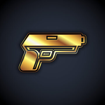 Gold Pistol or gun icon isolated on black background. Police or military handgun. Small firearm. Vector