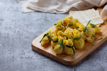 deep fried wonton on the dark background.