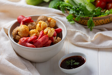 Meat ball variety type of meat on the white wooden background.
