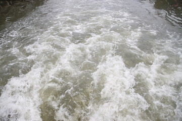 Wake ofa boat in the estuary of Bilbao