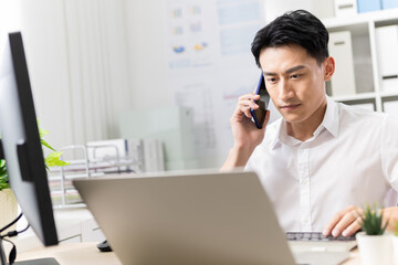 Fototapeta premium asian man speak on smartphone