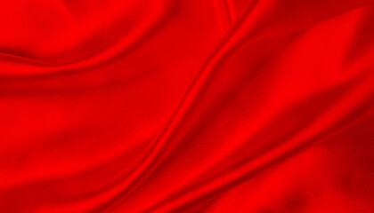 Red satin or silk fabric as background. Abstract background luxury cloth or liquid wave or wavy folds of silk texture satin velvet material. Closeup of ripples in red silk fabric.