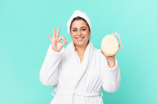 curvy pretty woman after a shower wearing bathrobe - Powered by Adobe