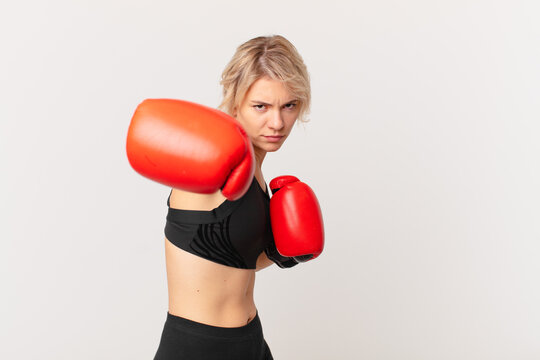 blond pretty woman with boxing gloves
