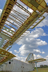 Old plane on the background of the summer sky