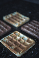 Tasty belgian waffles. Belgian or french waffles for breakfast. Vanilla or chocolate. 