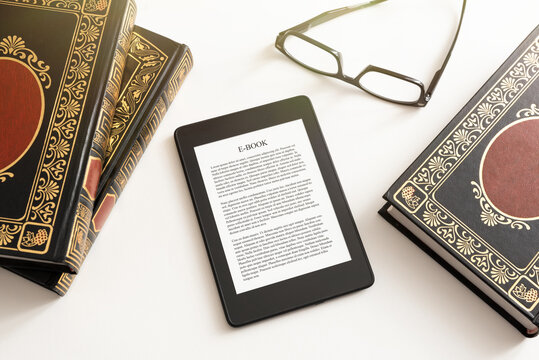 Book reading with e-book device concept