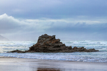Fototapeta na wymiar rock formation on the beach of sopelana, in the province of vizcaya