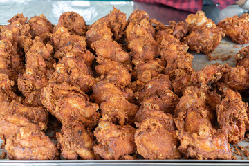 Asia Fried Chicken food street style in aluminum tray for sales.