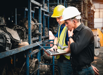 Portrait  man worker and engineer are wearing heltmet for safety and training his subordinate for...