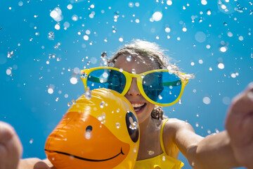 Spring break! Happy child having fun on summer vacation - 434320324