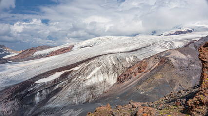 Maly Azau glacier on the Elbrus volcano. Height 3500m. Southwest side of Mount Elbrus. The glacier feeds the Baksan River. Altitude 3500 m. July 2020